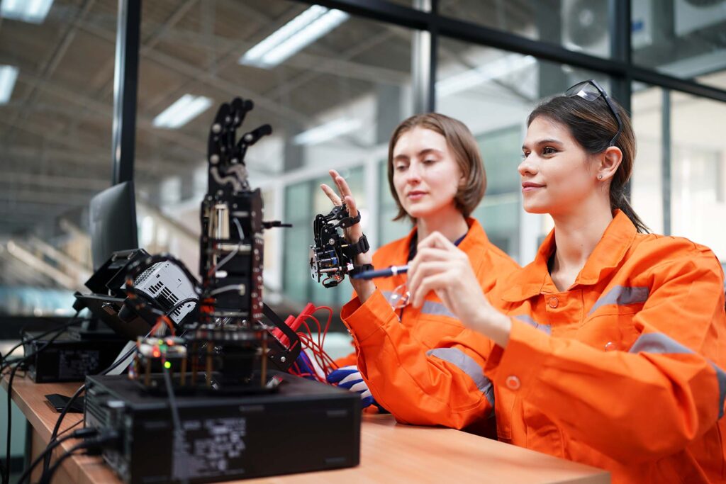 industry 4 0 young engineer works at a robotic ar YWX4WUW